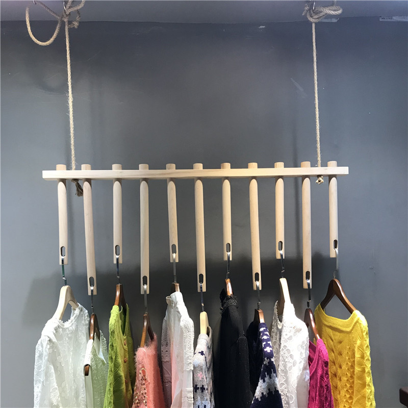 服装店展示架上墙吊顶吊架悬挂实木货架墙上侧挂衣服吊环麻绳吊挂