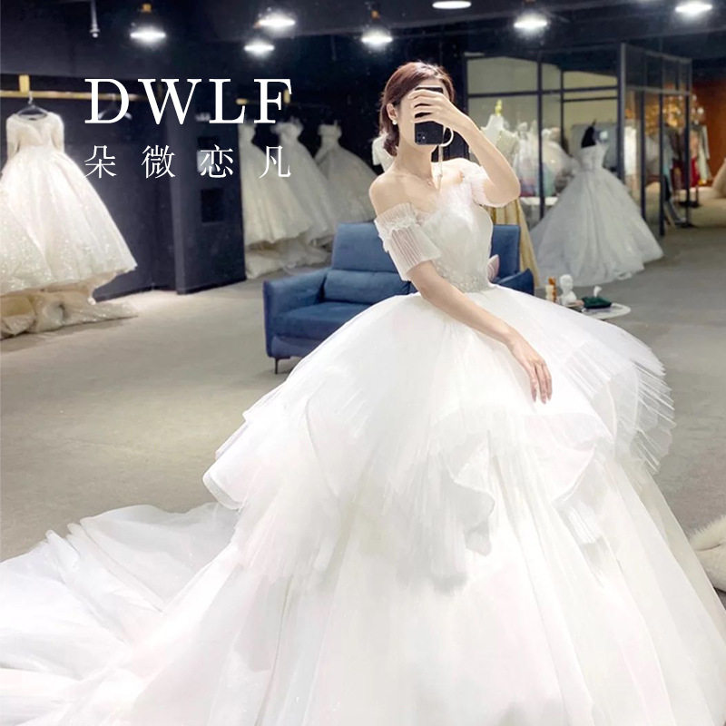 kadia2021婚纱礼服白色新娘梦幻一字肩简约气质拖尾法式森系婚纱