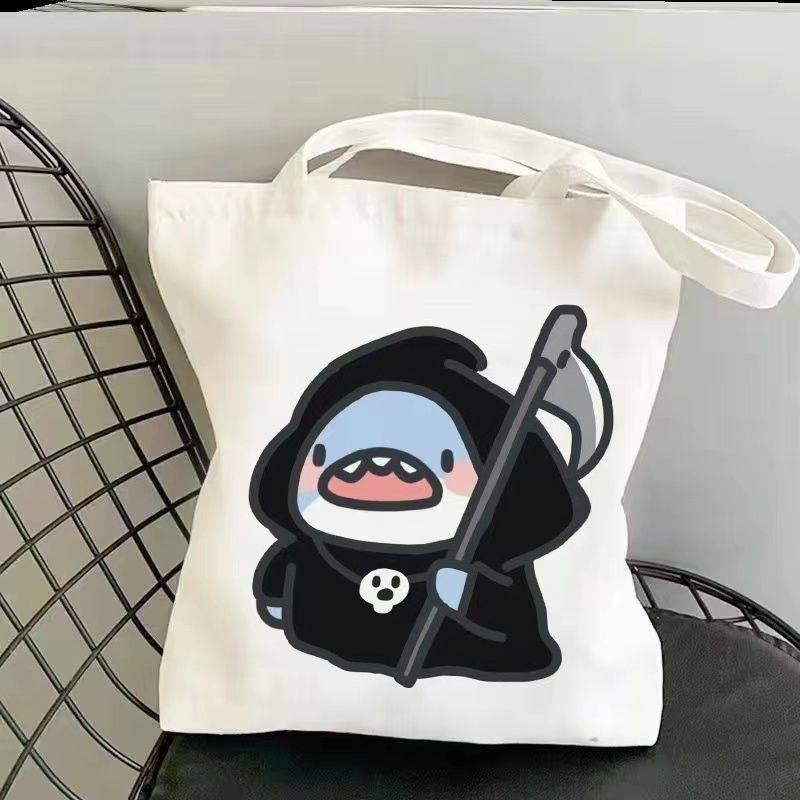 呆萌鲨鱼单肩包帆布包可爱肥肥表情学生帆布袋购物袋大容量手提袋