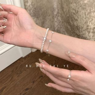 如蝶在野 珍珠弹力手链轻奢四叶草锆石千金高级气质手链 伦敦之夜