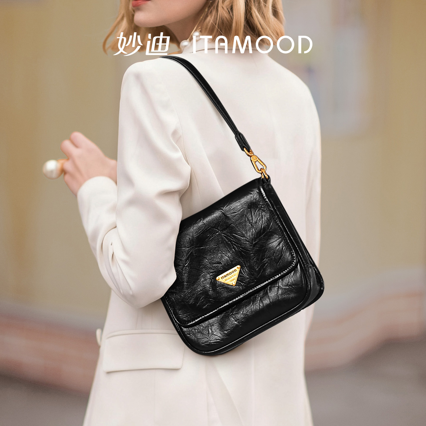 手抓花头层牛皮妙迪手拎斜挎包