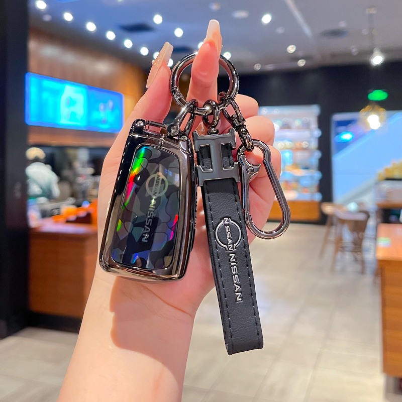 适用东风日产经典轩钥匙套逸逍客骐达劲客蓝鸟折叠车19尼桑壳包扣