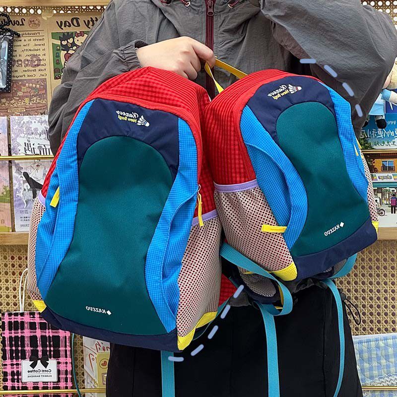 儿童户外拼色双肩包超轻男女童旅行书包小学生女孩研学登山背包潮