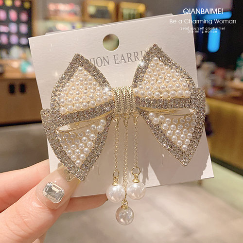 珍珠蝴蝶结流苏弹簧夹气质顶夹