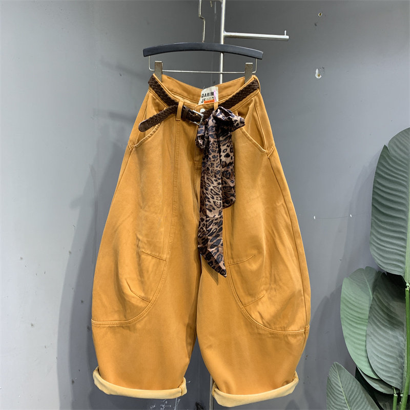 韩系亮橘色加绒加厚时髦牛仔裤女2025冬季新款时尚个性宽松弯刀裤