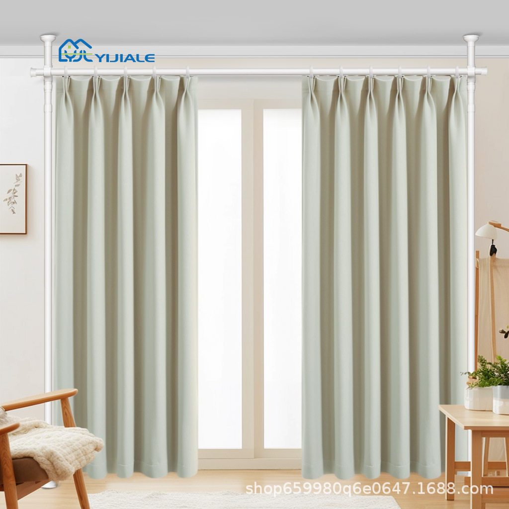 The room partition curtains stretch to separate the bedroom