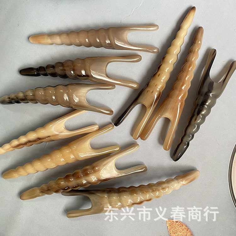 牛角实心按摩按鼻拨筋刮痧板黑花