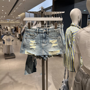 UR国内2025夏季女装设计感破洞裙裤造型牛仔短裤UYV850098