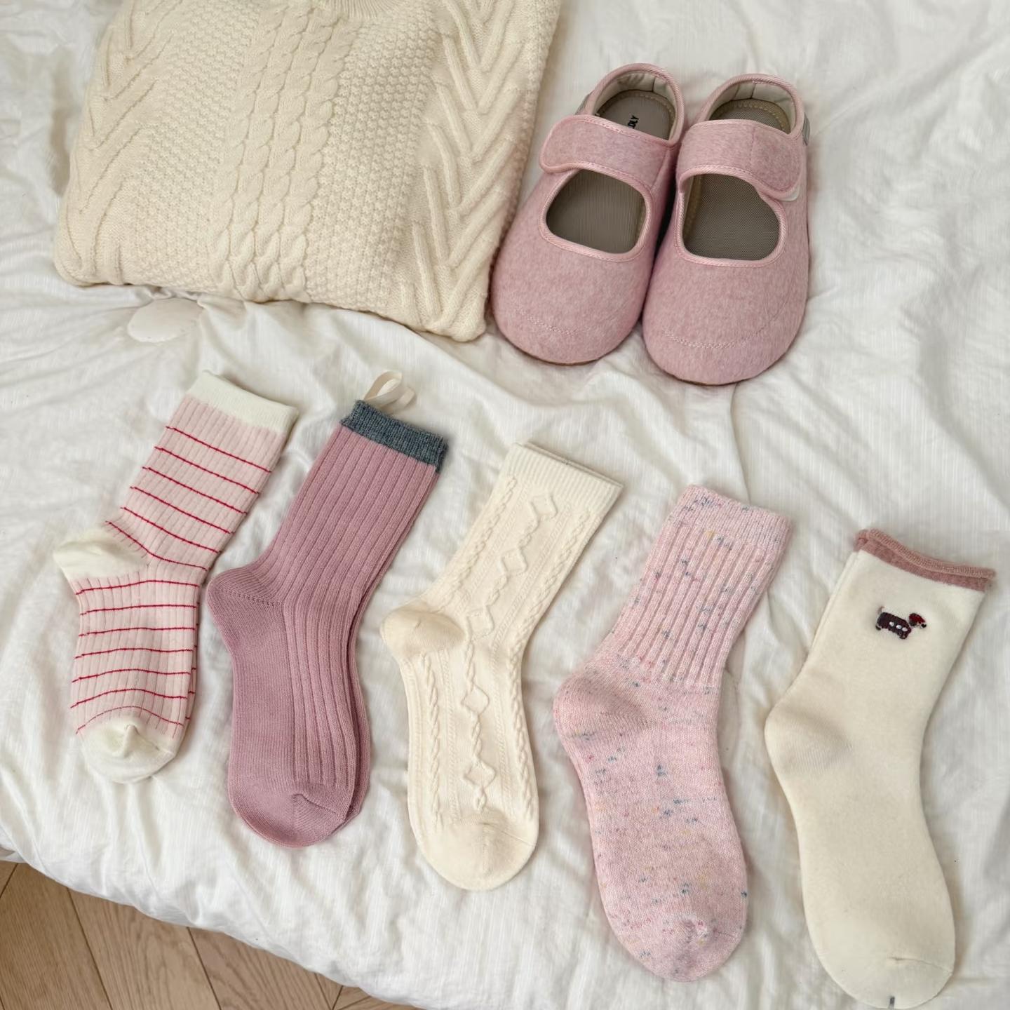 冬季加厚乳白粉色系女袜子网红蝴蝶结条纹浮雕保暖羊毛羊绒中筒袜
