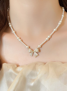 不规则珍珠锆石蝴蝶结吊坠项链复