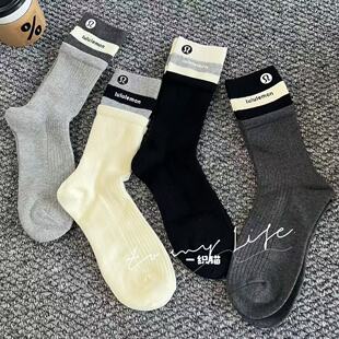 东大门洋气拼色双罗口潮牌字母个性 中筒袜女外穿街头运动潮袜