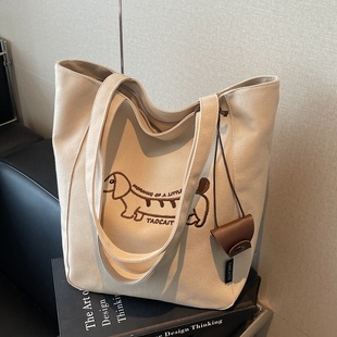 大容量托特包包女刺绣腊肠狗通勤帆布袋小众百搭学生上课单肩大包