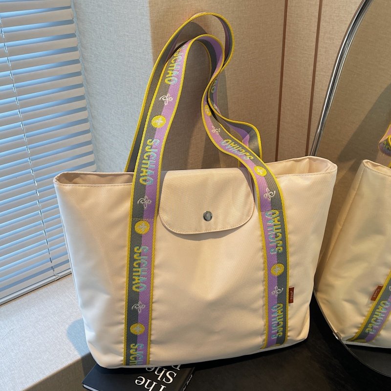 大容量托特包包女2025新款外出手提尼龙布袋小众时尚通勤单肩大包