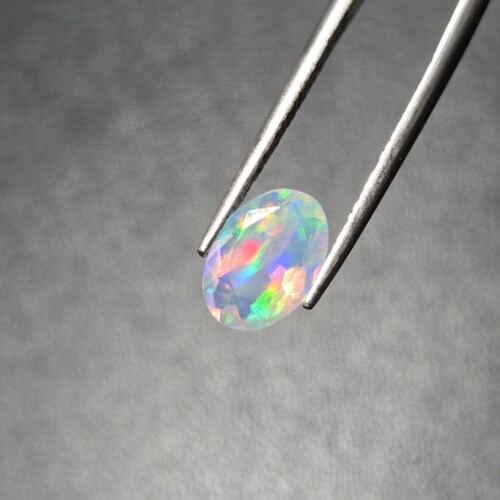 天然欧泊戒指刻面欧泊火彩如极光尺寸7*9.8mm火彩如流星雨纯天然