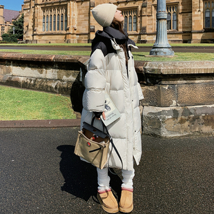 白色学院风连帽立领长款羽绒服女2025冬新款休闲范白鸭绒保暖外套