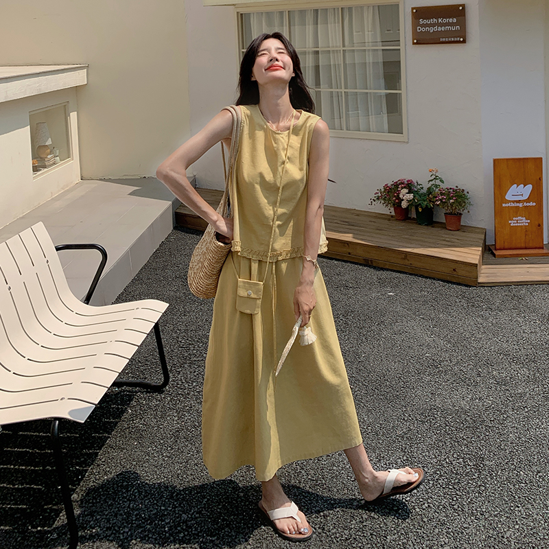 黄色甜酷休闲套装裙女2025新款慵懒风木耳边拼接上衣半身裙两件套