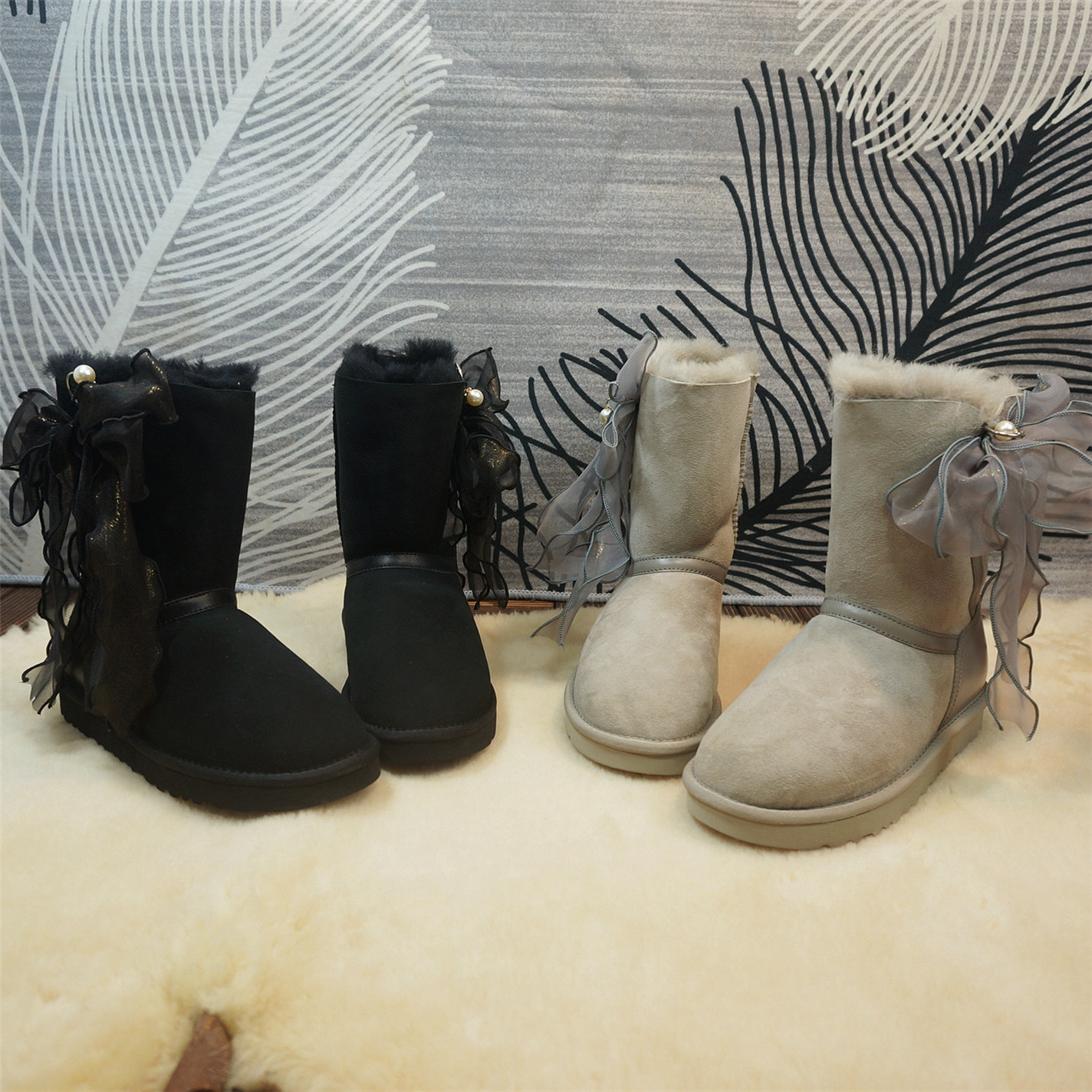 冬季新款真皮羊皮毛一体女士雪地靴中筒靴丝带蝴蝶结保暖棉靴86-5