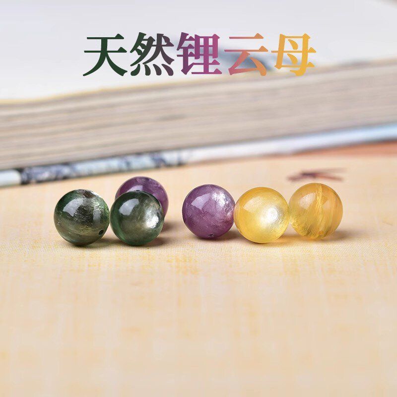 天然金紫绿锂云母祖母晶水晶散图片