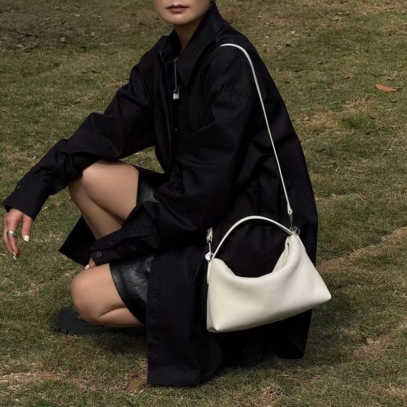 欧尚典女包2026春夏新款真皮hobo软皮手提斜挎包大容量通勤饺子包