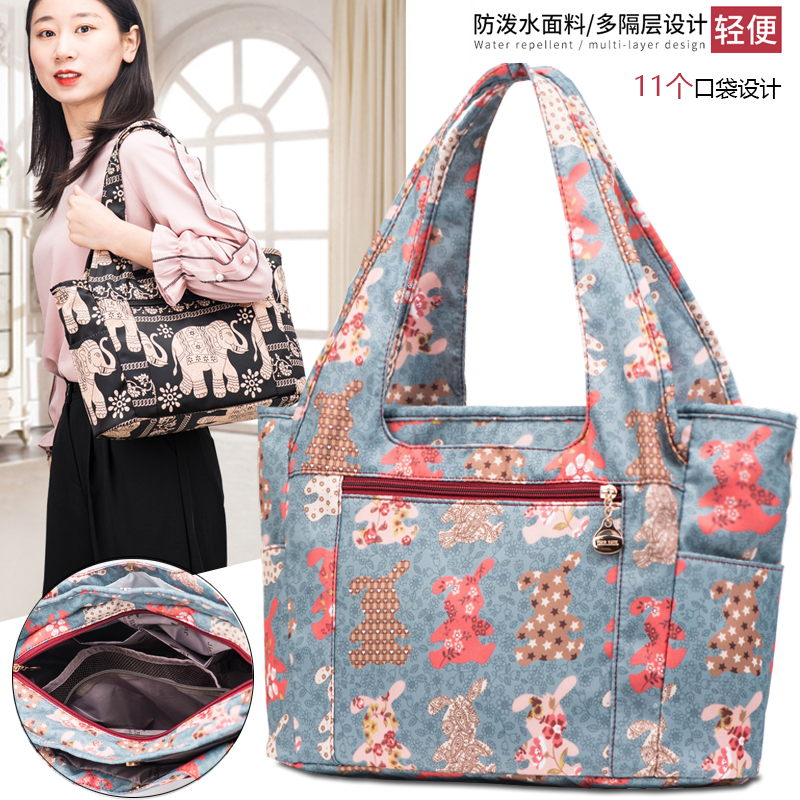 印花手提牛津布女包2025新款韩版轻便大容量多口袋尼龙防水单肩包