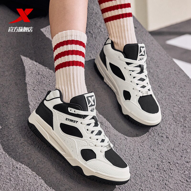 特步女鞋板鞋浪浪鞋冬季新款厚底增高运动鞋女复古潮流休闲鞋拼色