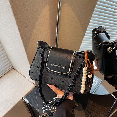 艾米兔女包2026新款流行简约百搭日常波点气质通勤休闲单肩斜挎包