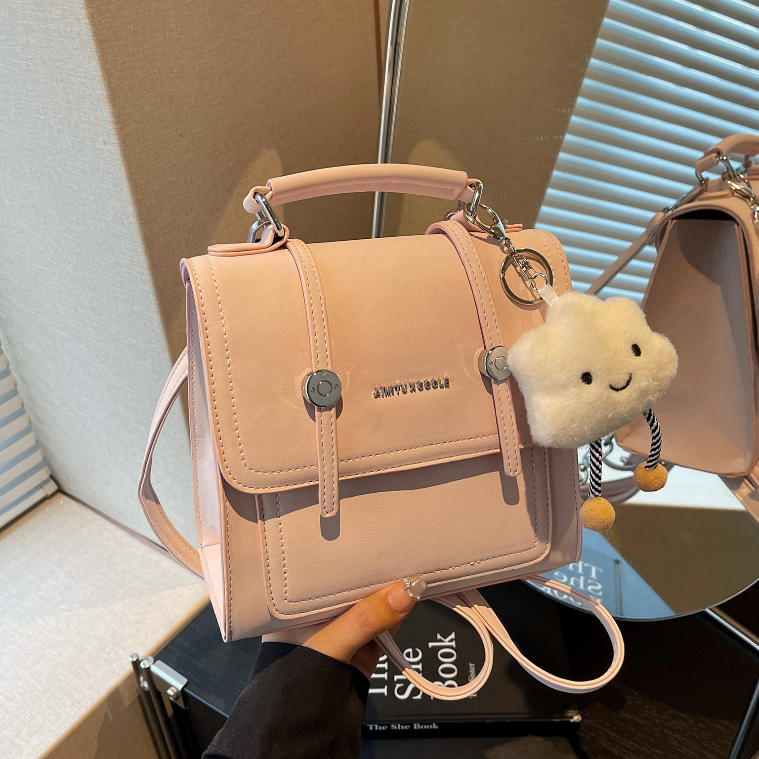 艾米兔女包2026新款韩系百搭流行通勤洋气纯色小众设计双肩包