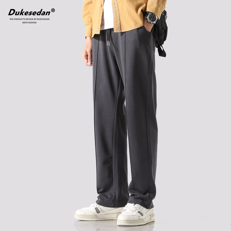 拖地卫裤男宽松运动阔腿休闲长裤