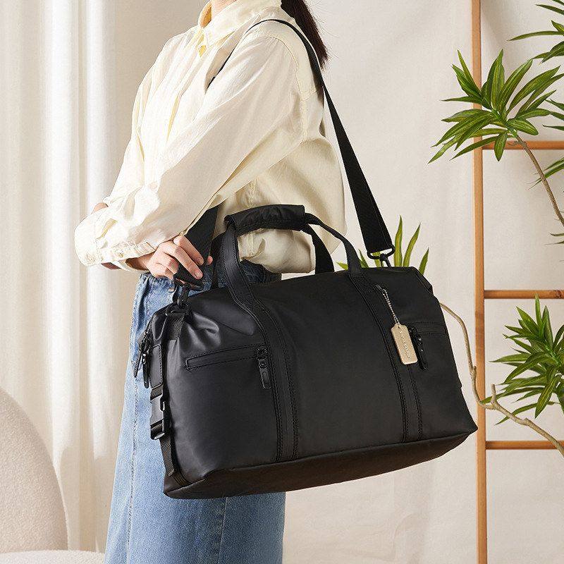 BOTTA DESIGN高级感旅行包男款皮革出差手提包防水大容量短途运动