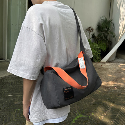 斜挎包女休闲运动健身包大容量帆布单肩包男生包包旅行通勤小挎包
