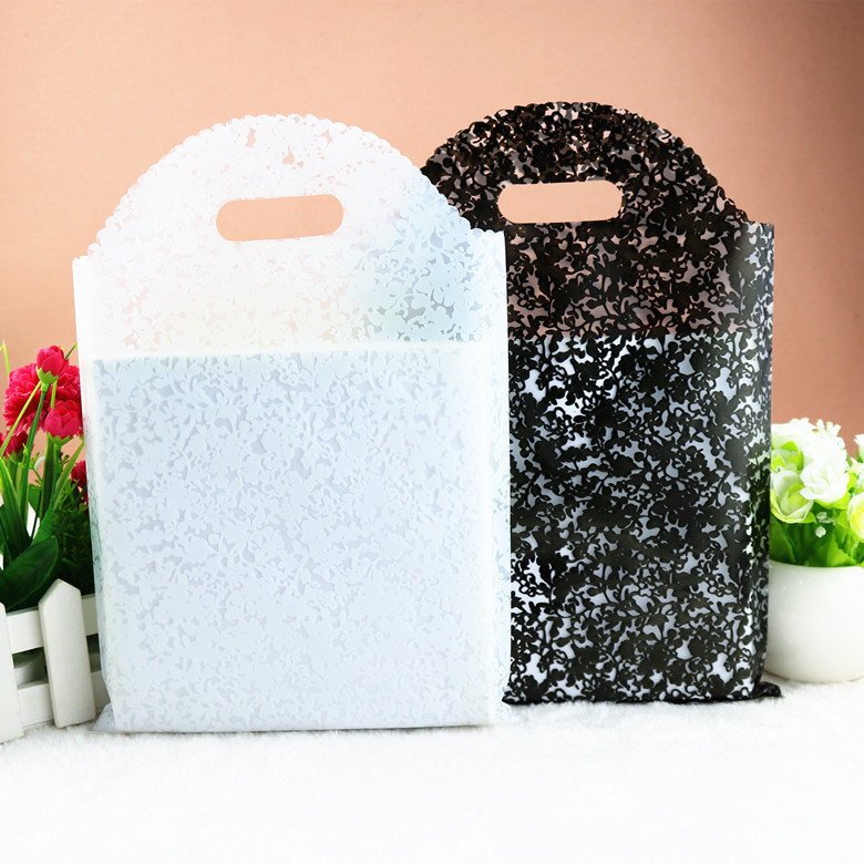 包邮新款加厚花边手提拎购物化妆礼品童衣服装店塑料袋子批发定做