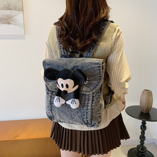 菇八八水洗牛仔双肩包女