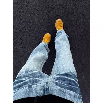 水洗蓝闪电纹微喇牛仔裤男款