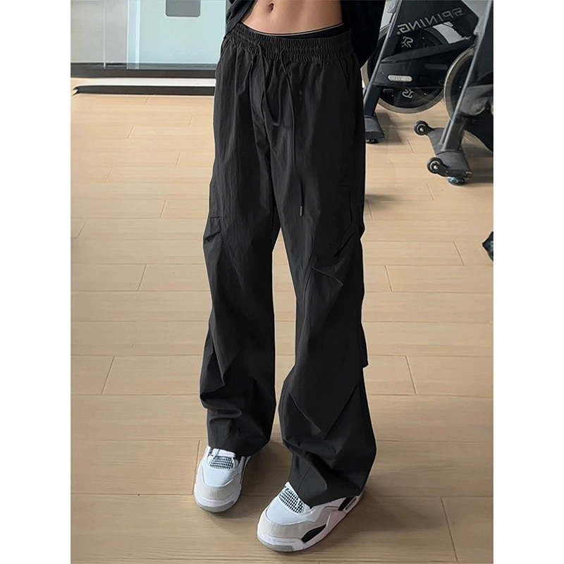 黑色斜切伞兵工装裤男女款图片
