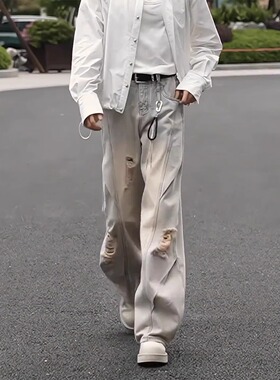 蓝色水洗破洞牛仔裤男模夏季发型师阔腿裤子美式休闲弯刀微喇长裤