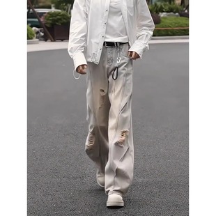 蓝色水洗破洞牛仔裤男模夏季发型师阔腿裤子美式休闲弯刀微喇长裤