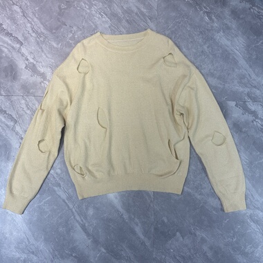 11.23范思.. 春秋甜酷风不规则破洞镂空毛针织衫