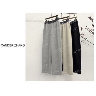 巨显瘦时尚拼接腰针织弯刀裤