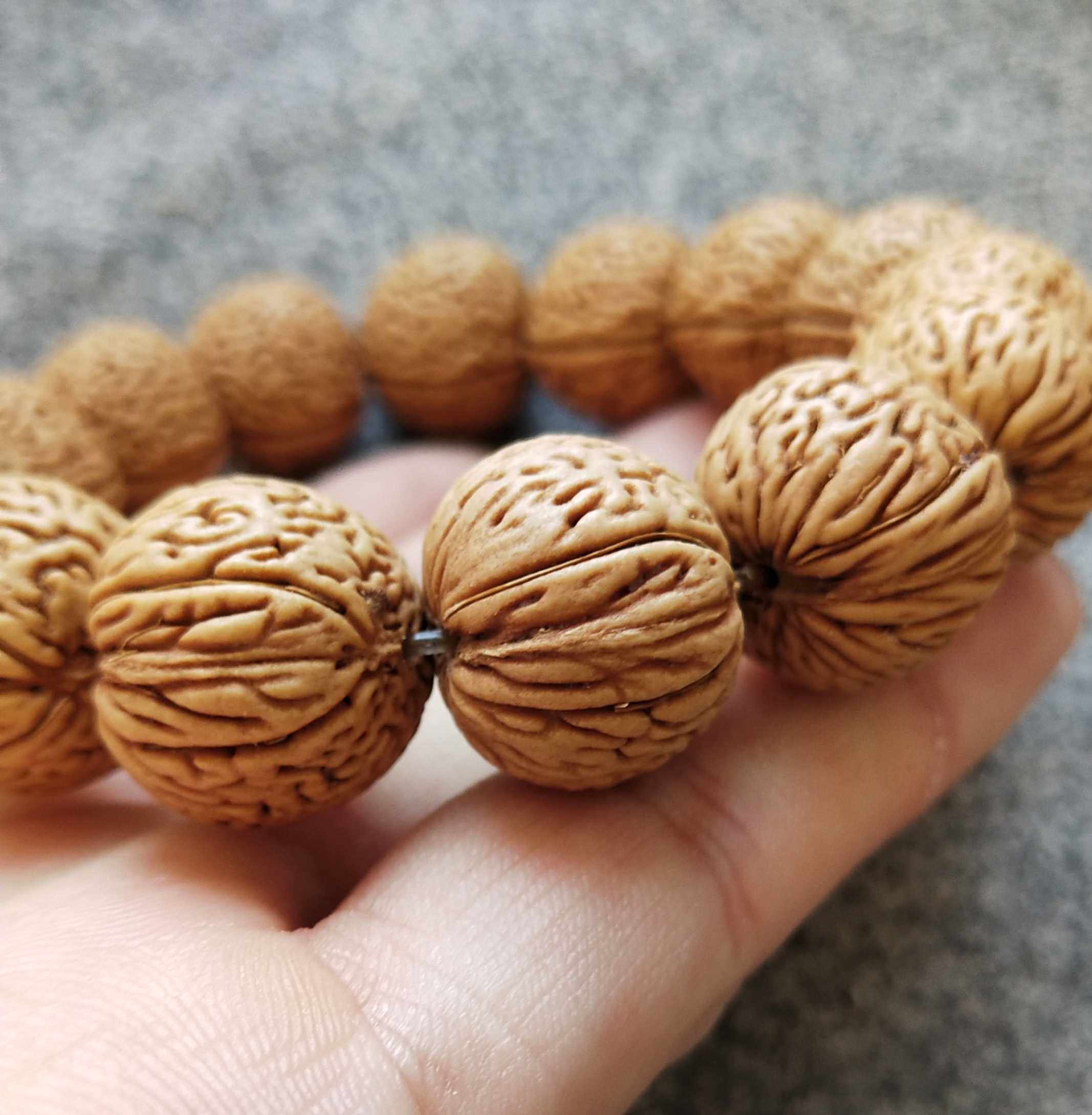 柳叶脐桃核手串 野生山桃核矮桩脑纹密纹桃胡18MM大柳叶文玩手串