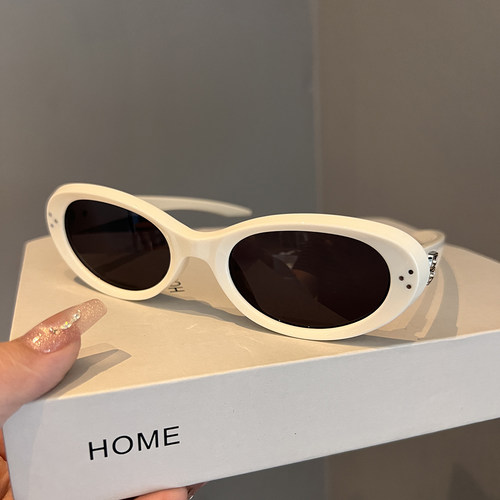 高级感复古椭圆米白框gm墨镜女