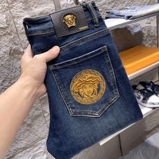 法国进口高端品牌刺绣牛仔裤男士秋冬厚款蓝色弹力修身小脚长裤子