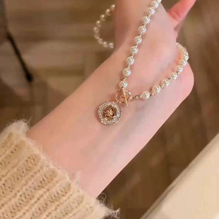 法式优雅珍珠OT扣款纽扣吊坠项链配饰女轻奢气质百搭秋冬毛衣链