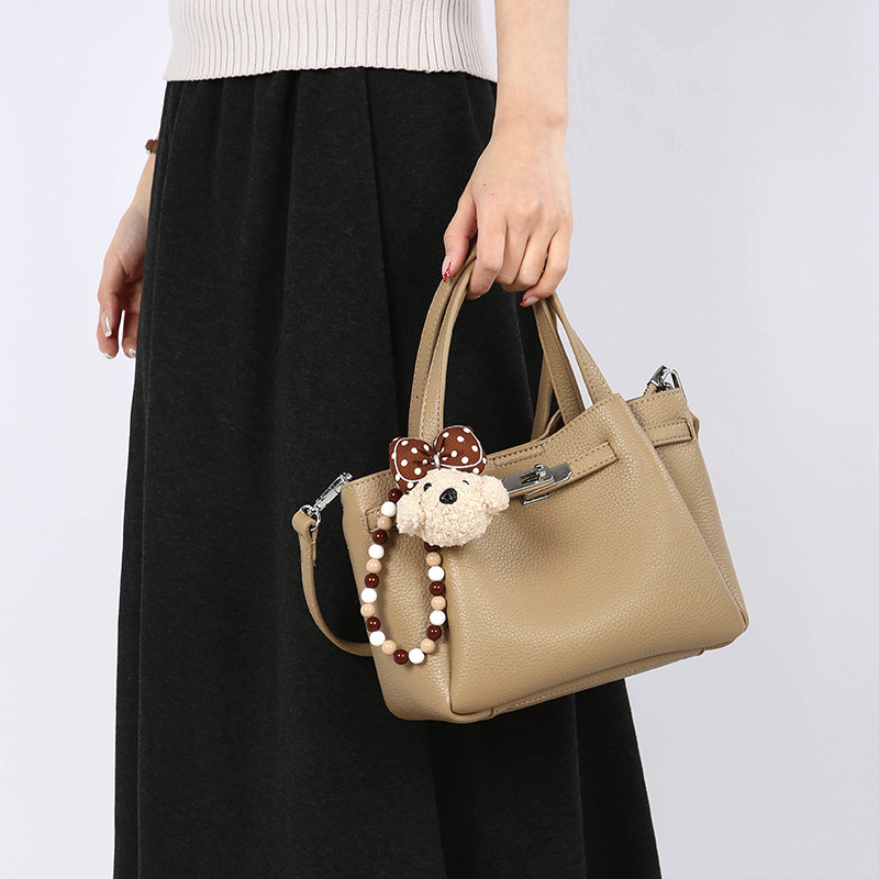 夏季包包女士2026新款大容量水桶包女款斜挎通勤真皮手提包女包