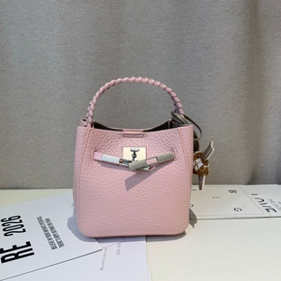 劳拉时黛轻奢质感荔枝纹凯莉包水桶包2026新款百搭时尚手提斜挎包