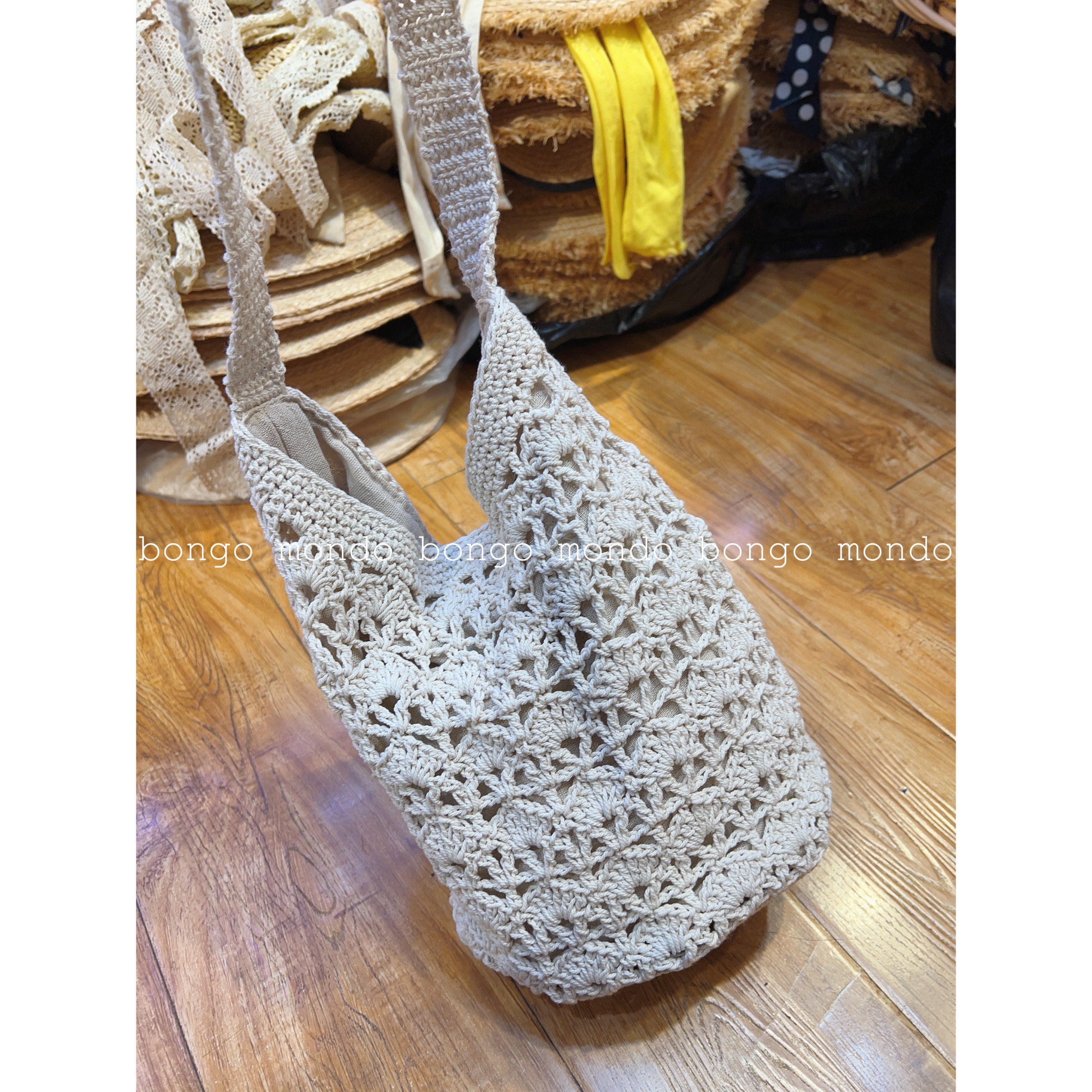 森系新款包包手工钩花单肩女编织袋甜美百搭可爱小清新风格水桶型