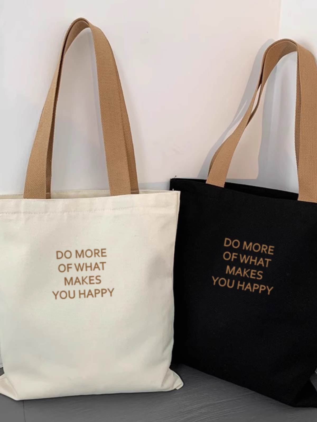 简约小字母帆布包男女2025年新款休闲百搭大容量中学生上课手提袋