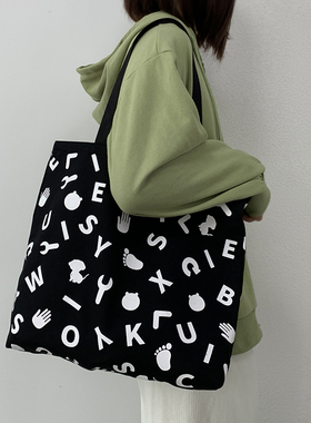 帆布包女上课大学生单肩托特包手提韩风小众设计感黑色帆布袋书包