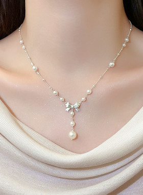 银色蝴蝶结珍珠吊坠项链女2026新款轻奢小众锁骨链高级感气质配饰