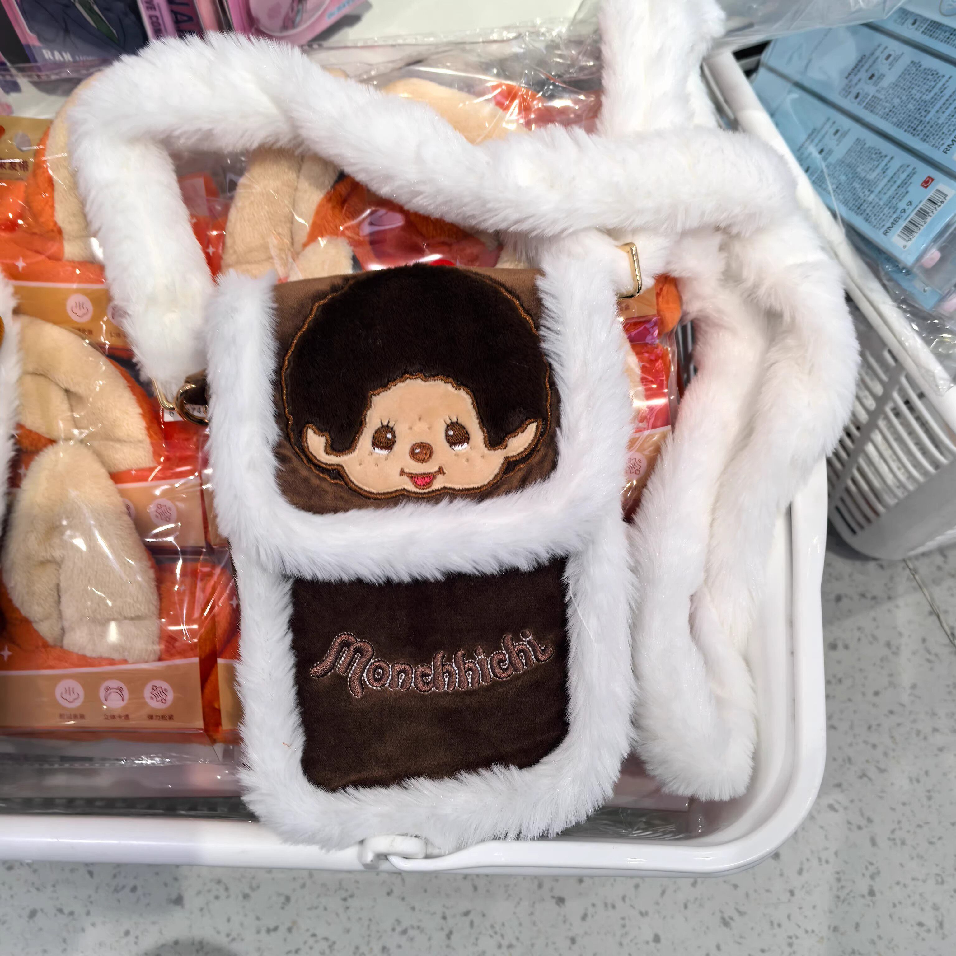 名创优品蒙奇奇萌趣趣随身手机包