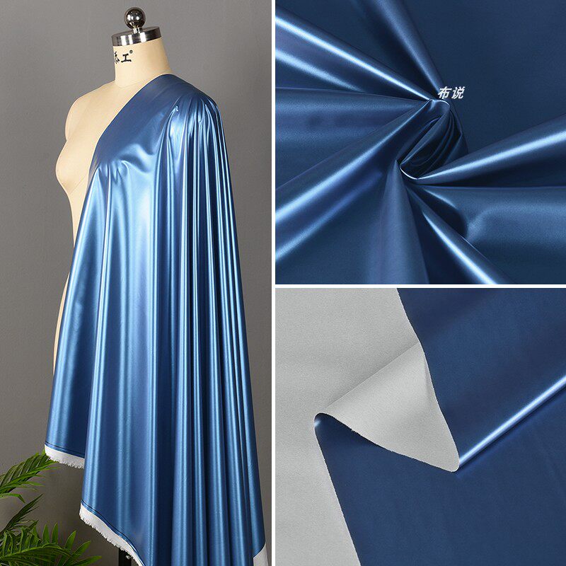 深蓝色双色彩膜羽绒服面料 渐变幻彩流光pu皮外套棉服防水布料